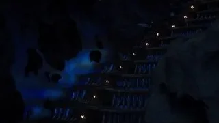 blue lit staircase in dark cave — The Avengers
