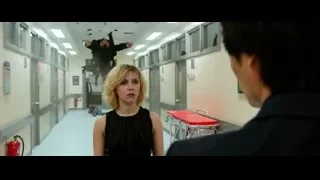 woman and man in hospital corridor — Lucy