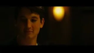 Young man's thoughtful face in dark room — Whiplash