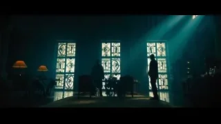 dimly lit room with stained glass — John Wick: Chapter 4