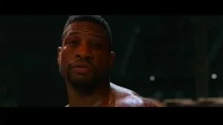 Man in boxing ring covered in sweat — Creed 3