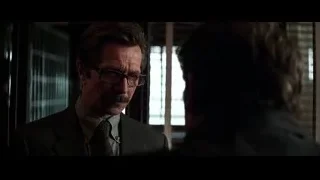 man in suit with mustache and glasses — Batman: The Dark Knight