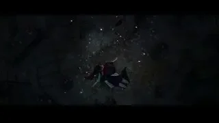 person lying on ground in debris-filled room — The Amazing Spider Man 2