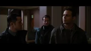 three men talking in hallway — Batman: The Dark Knight Rises
