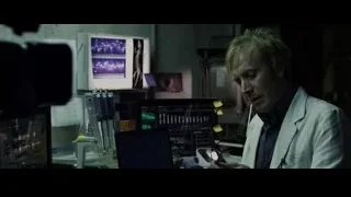 Man working in dimly lit laboratory — The Amazing Spider Man