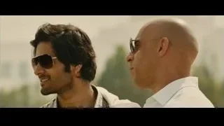 two men facing each other with sunglasses — Furious Seven