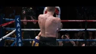two boxers fighting in a ring — Southpaw