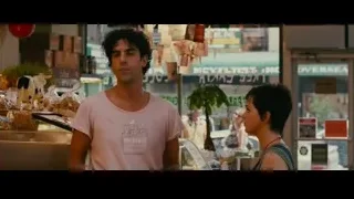 man and woman at food stand with Diversion sign — The Dictator