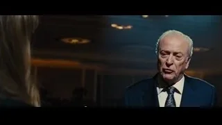 elderly man in suit shouting in dimly lit room — Now You See Me