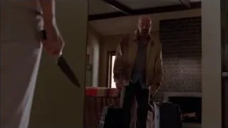 man with knife in hallway — Breaking Bad