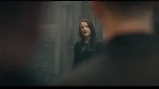 Woman in black jacket in dimly lit room — Peaky Blinders
