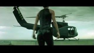 Men standing next to black helicopter — The Matrix