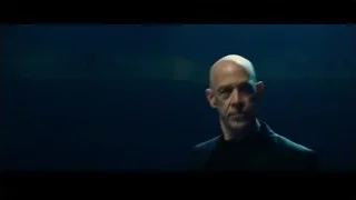 bald man cheering on stage — Whiplash