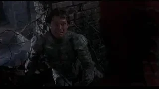 Man in armor in cave — Spider Man
