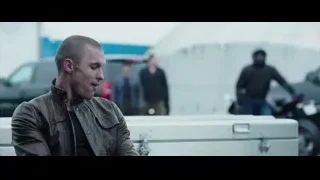 man in leather jacket by white truck — Deadpool