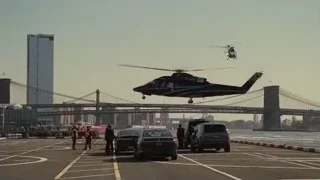 helicopters flying over city bridge — Succession