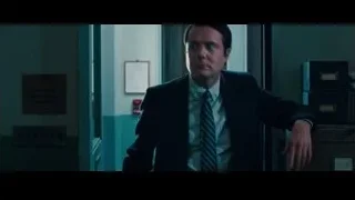 man in suit standing in dimly lit hallway — The Secret Life of Walter Mitty