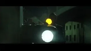 man in suit and sunglasses in yellow smoke — The Matrix