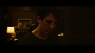 drummer playing drums in dimly lit room — Whiplash