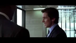 Man in suit in office thinking — Batman: The Dark Knight
