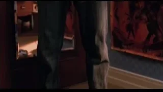 shirtless man in room with blue wall — Spider Man