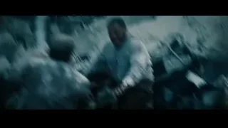 men in rubble holding metal pole — Superman: Man of Steel