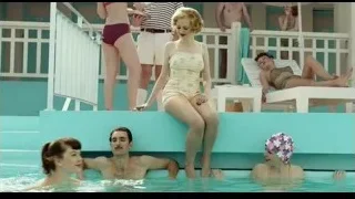 People in swimming pool with woman in swimsuit — Life of Pi