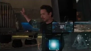 Tony Stark interacting with large screen — The Avengers