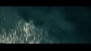 Silhouette of person flying in dark sky — Superman: Man of Steel