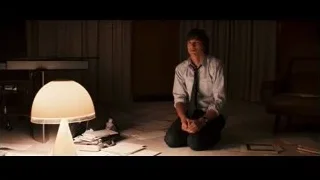 Man sitting on floor in messy room — Jobs