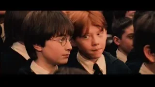 Boys in uniforms looking serious — Harry Potter and the Philosophers Stone