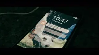 cracked smartphone screen displaying message — The Social Dilemma