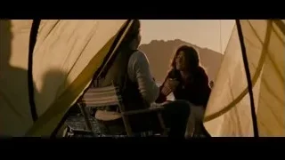 man and woman sitting inside tent — Into the Wild