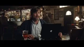 man with laptop at bar counter — The Big Short