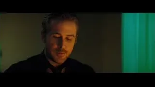 man with beard in dimly lit room — La La Land