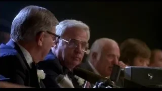 men at table with microphones — Rocky III