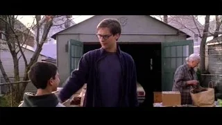 men standing in front of garage — Spider Man 2