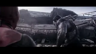 Person sitting by destroyed building — Deadpool