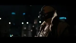 Bane wearing mask in dark room with city — Batman: The Dark Knight Rises