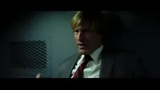 Man in suit in dark room with vent — Batman: The Dark Knight
