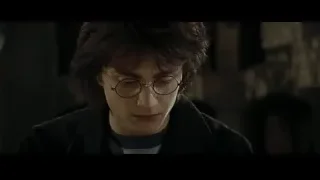 young man with glasses in dimly lit room — Harry Potter and the Goblet of Fire