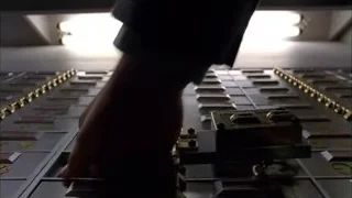 person's hand on a control panel — Breaking Bad