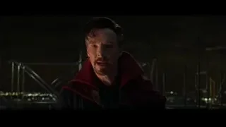 Doctor Strange in red cloak against city skyline — Spiderman: No Way Home