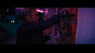 Woman and man in dark alleyway at night — La La Land