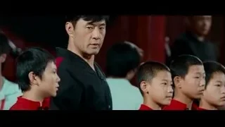 Man standing in front of young boys — The Karate Kid