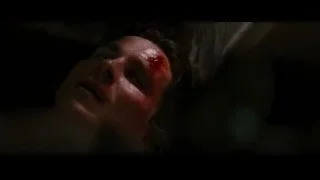 man's bloody face in dark room — Batman: The Dark Knight Rises