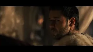 Man in fur coat looking off to side — Gladiator
