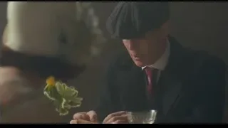Man in suit smoking at table — Peaky Blinders