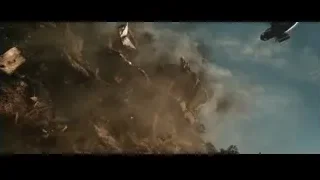 helicopter flying over rocky cliff with smoke — Iron Man 3