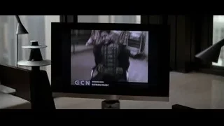 TV screen showing Batman related imagery — Batman: The Dark Knight